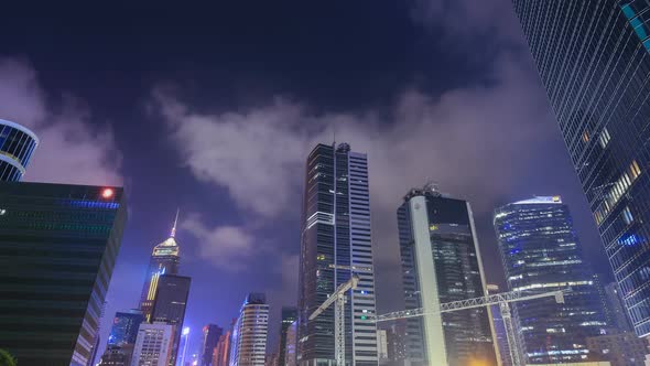 Time-lapse of Building in Hong Kong city at night, China