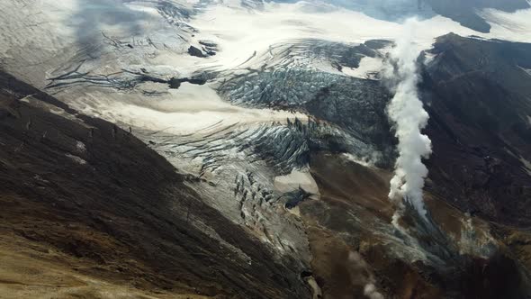 glacier in a volcano with smoke