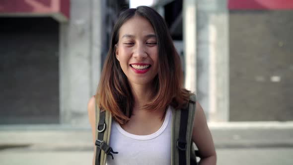 Asian backpacker woman feeling happy traveling blogger female walking at Chinatown  alt