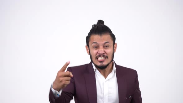 Angry Indian businessman trying to control agression by counting numbers alt