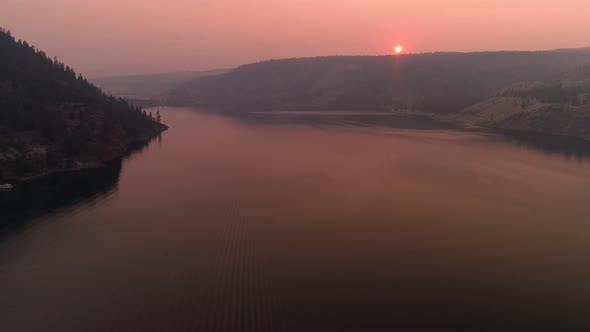 Sunset Aerial Over Lake Roosevelt In Forest Fire Smoke Haze alt