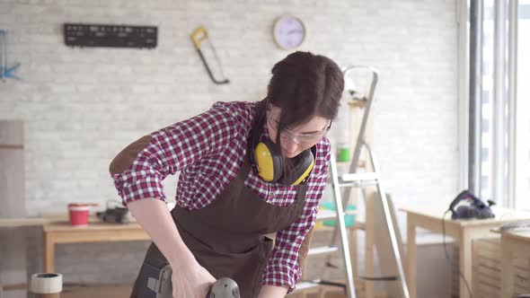 Portrait Professional Young Worker Carpenter Woman Working Electric Drill alt
