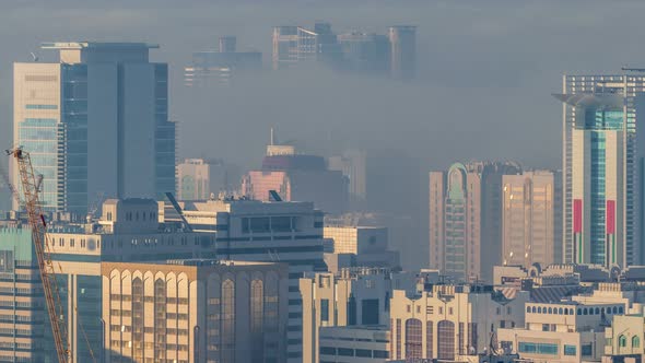 Skylines Under the Thick Fog at the Street Timelapse of Abu Dhabi at Morning alt