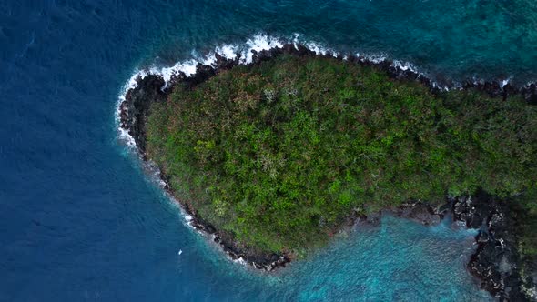 Top down view on peninsula and beatiful blue water alt