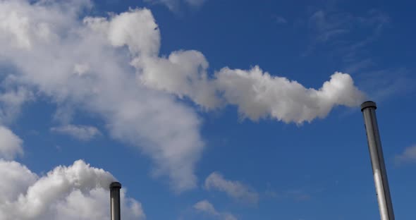 Steam of Water coming out of the Chimney of an Incinerator, Near Paris, Slow motion 4K alt