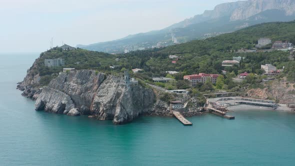 Beautiful bay with blue water and old town alt