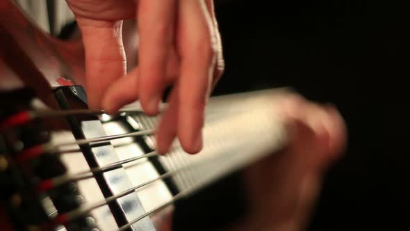 Bass player close up studio shot