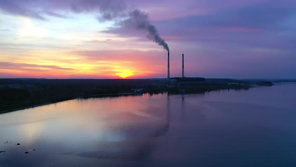 Blue background of the river and industrial plant.  alt