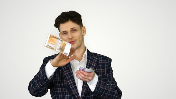 Wealthy Businessman Throwing Money in Air on Gradient Background. alt