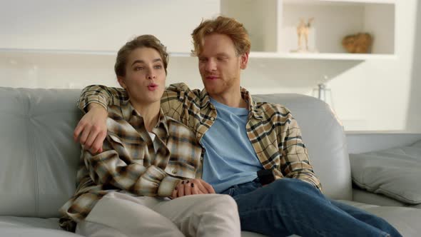 Husband Switching Tv Channel at Cozy Home alt