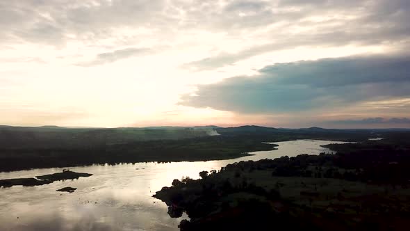 Scenic view of Nile river in Jinja Uganda. Drone reveal natural African landscape and dramatic sky. alt