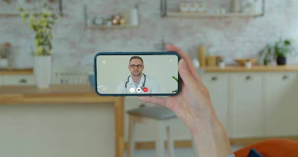 Woman Checks Possible Symptoms with Professional Physician, Using Online Video Chat. Young Girl Sick alt