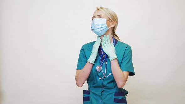 Medical Doctor Nurse Woman Wearing Protective Mask and Rubber or Latex Gloves - Neck Illness alt