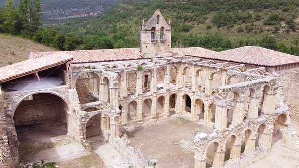 Aerial View of the Ruins Of An Ancient Abandoned Monastery In Santa Maria De Rioseco, Burgos, Spain. alt