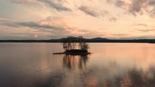 Aerial View of a Small Island in the Center of the Lake alt