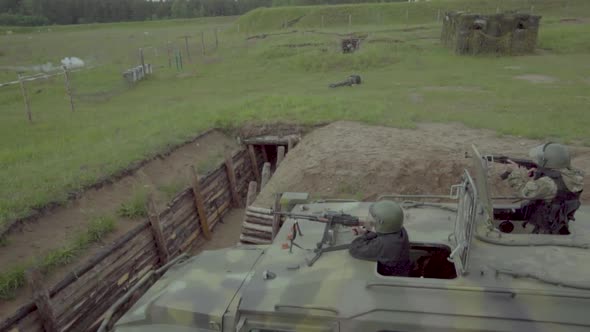 Professional Military Vehicle with a Firearm on the Roof
