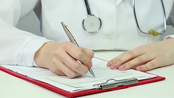 Physician Fills in Prescription Form and Gives It to Patient, Office Reception alt