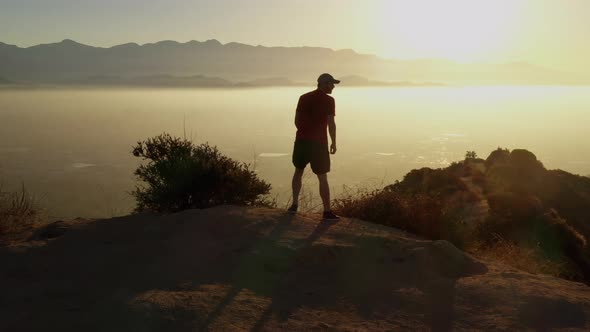 A man going for his morning workout in the hills above Hollywood alt