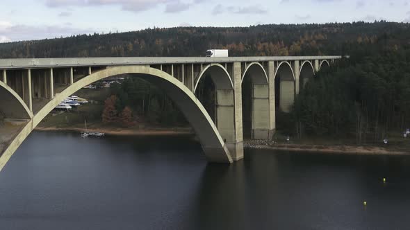 Concrete bridge over river.