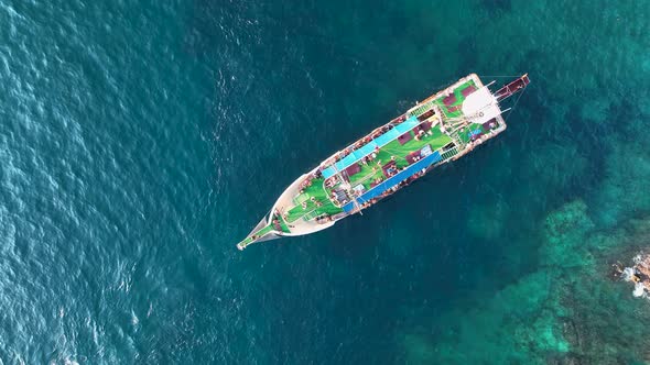 A large yacht stands at sea aerial view 4 K alt