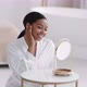 Young Happy African American Lady Wearing Bathrobe Caressing Her Face Enjoying Condition of Her Skin - VideoHive Item for Sale