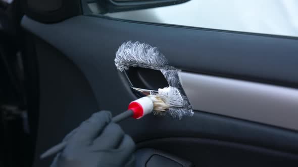 Close Up Cleaning of Interior By a Soft Brush alt
