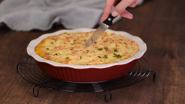 Shepherd's pie, traditional British dish with minced meat, vegetables and mashed potatoes.