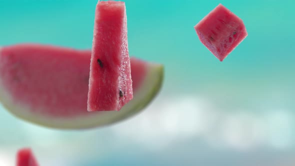 Flying of Watermelon and Slices in Blue Beach Background alt