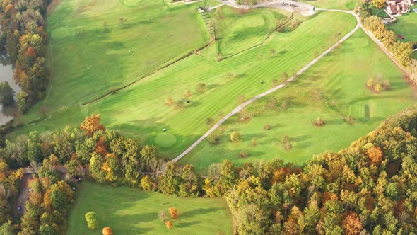 Aerial View Over Golf Field Durring Sunset in Autumn