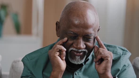 Close Up Male Portrait African American Pensive Deep in Thoughts Elderly Businessman Sit Indoors alt