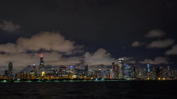 Downtown Chicago Skyline With Clouds At Night