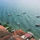 roofs of houses on shore and group boats - VideoHive Item for Sale