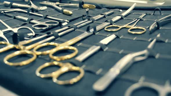 On The Table Is A Kit Of Surgical Instruments 3