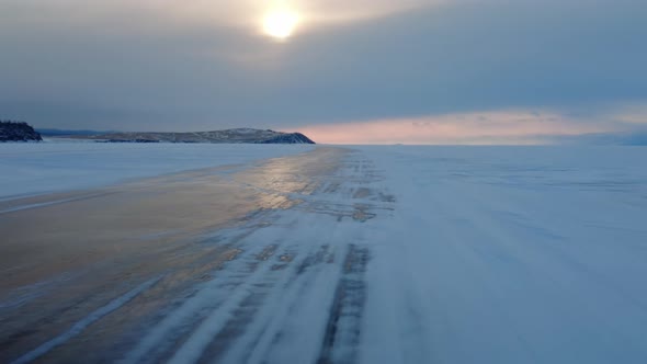 Driving on Ice Road of Lake Baikal alt