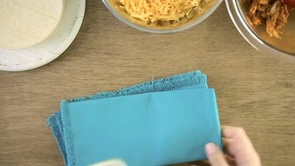 Chicken enchiladas with cheddar cheese and sauce. alt