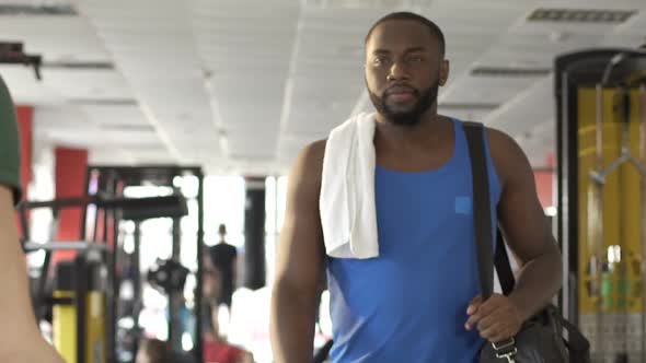 Confident and Successful Afro-American Man Leaving Gym After Workout, Slow-Mo alt