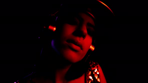 Female Dancer Posing Against Colourful Background alt