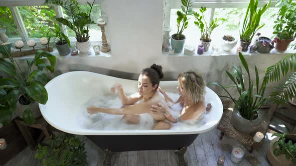 Female cople enjoying bathing.