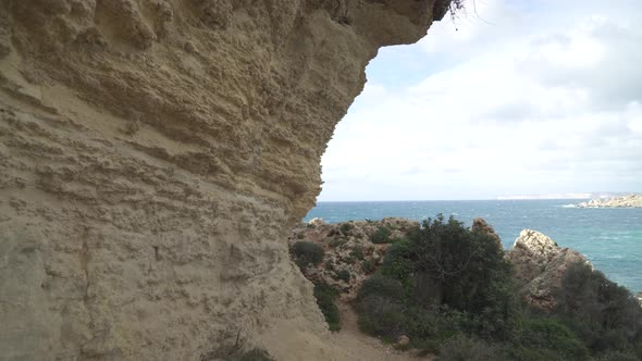 Steep and Big Limestone Rock of Il-Qarraba Near Mediterranean Sea on Ghajn Tuffieh Bay