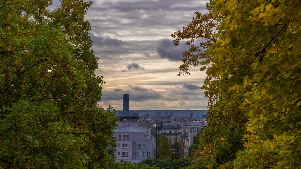 Paris Rooftops and Montparnasse Tower at Day Under Cloudy Sky Trees alt