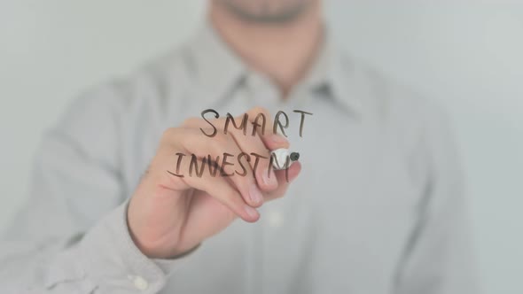 Smart Investment Writing on Screen with Hand alt