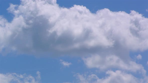 Time-lapse Motion Clouds Blue Sky Background alt