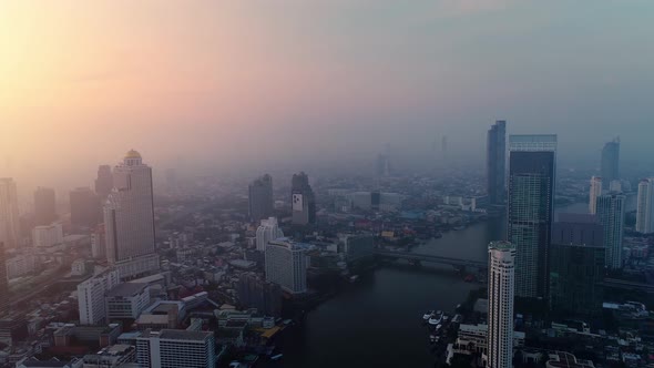 4k Aerial city view of Bangkok downtown, Flying over Bangkok, Thailand. alt