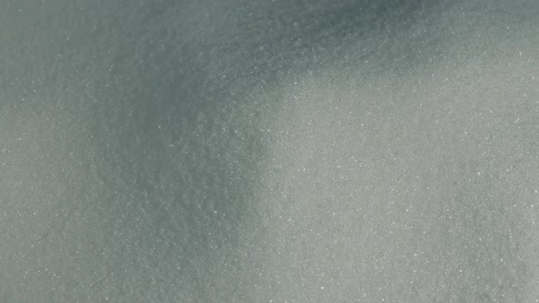 Sugar Surface Rotating Slowly Closeup alt