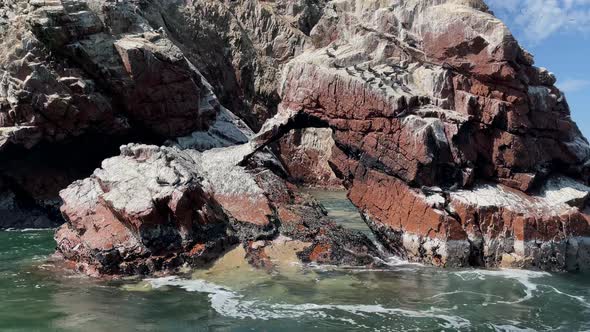 View from Boat of Birds on Rocks in Ballestas Islands, Peru alt