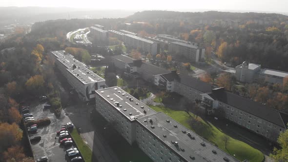 Misty Fall Day at Residential Block Buildings at Suburban Area Aerial Forward alt