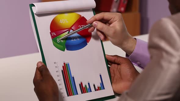 Two Businessmen Working Together alt