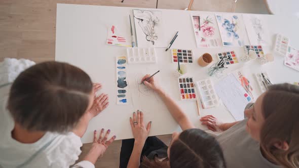 Front View of Four Beautiful Caucasian Female at Art Workshop alt