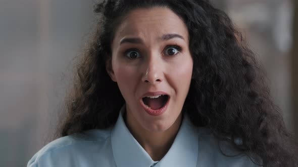 Amazed Beautiful Young Arab Business Lady Girl Office Worker Surprised Looking at Camera Making Big alt