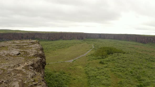 Asbyrgi Canyon With Verdant Vegetation Under Overcast Sky In Iceland. Tilt-up alt